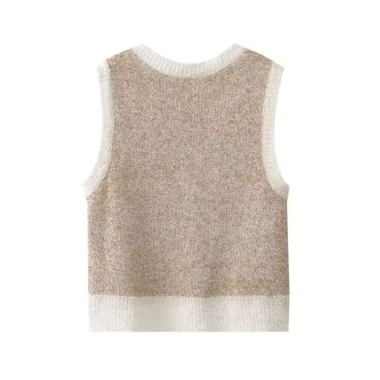 Back view of soft beige cropped knit vest with ribbed hem – minimal sleeveless sweater for women
