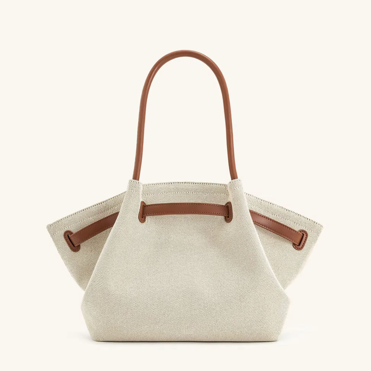 Toscana Tote front view – cream canvas bag with tan leather-look handles
