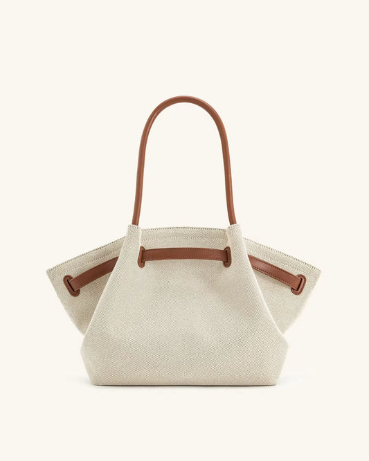 Toscana Tote front view – cream canvas bag with tan leather-look handles
