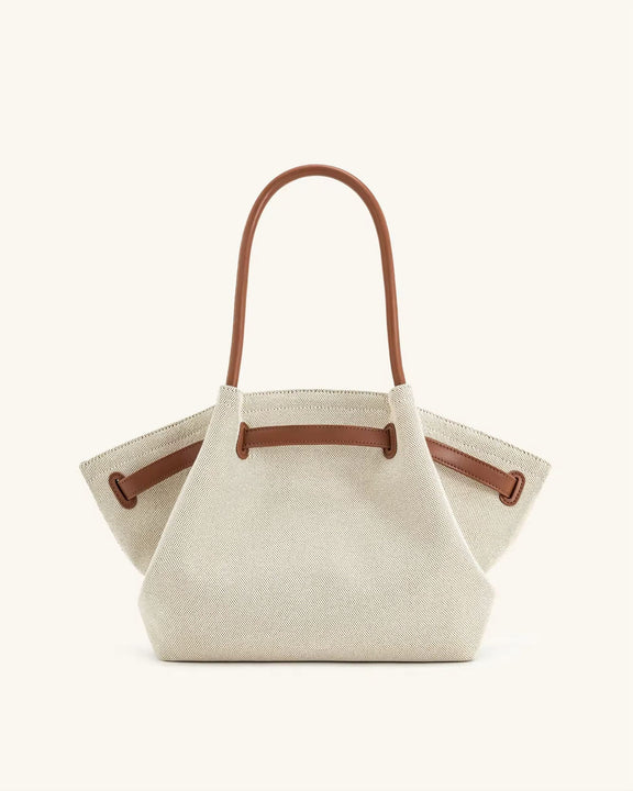 Toscana Tote front view – cream canvas bag with tan leather-look handles
