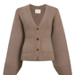 Stylish Khaki Cardigan with Metal Buttons, crafted from a high-quality wool-polyester blend. Features an elegant O-neck, full sleeves, and a regular fit. This short cardigan (4-16 inches) is perfect for modern women seeking comfort and style. Ideal for pairing with jeans or skirts for a chic look. Care instructions: Hand wash or dry clean recommended.
