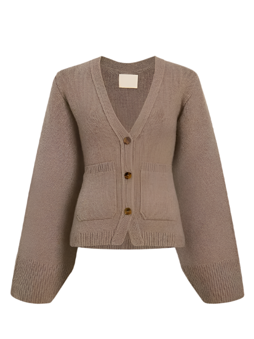 Stylish Khaki Cardigan with Metal Buttons, crafted from a high-quality wool-polyester blend. Features an elegant O-neck, full sleeves, and a regular fit. This short cardigan (4-16 inches) is perfect for modern women seeking comfort and style. Ideal for pairing with jeans or skirts for a chic look. Care instructions: Hand wash or dry clean recommended.
