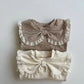 Beige and brown baby tops for girls made from 100% cotton, featuring a decorative bow, lace trims, and floral pattern, perfect for fall fashion and comfortable baby clothing.