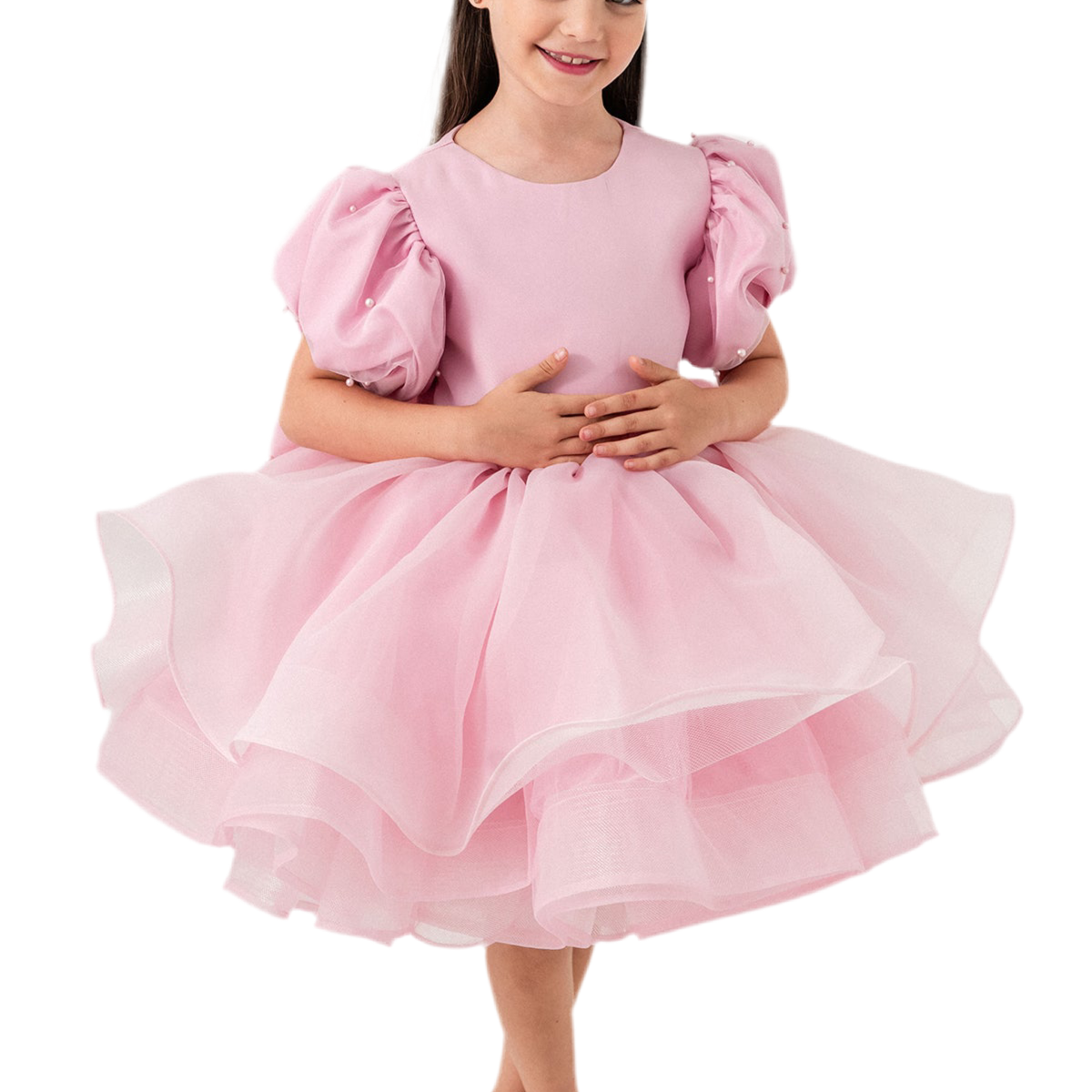 Luxury blush pink princess dress for toddler girls featuring elegant hand-sewn pearl embellishments on puff sleeves, a voluminous layered tulle skirt, and a dramatic oversized bow at the back. Perfect for birthdays, weddings, flower girl moments, and formal occasions. Soft 100% cotton lining for sensitive skin. Couture-inspired, handmade design for unforgettable childhood memories. Ideal for premium kids fashion, special occasion outfits, and baby girl party dresses. Elegant toddler outfit with invisible zi