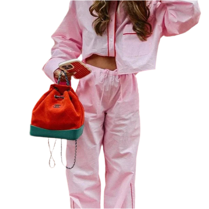 Cozy vintage-inspired pink suit set for women – long sleeve shirt and loose pants.