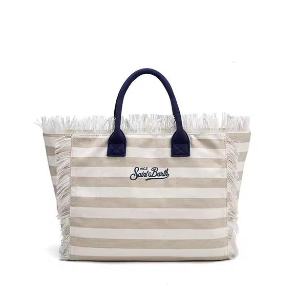 Saint Barth beach bags in hot pink, leopard print, ivory and natural straw – colorful canvas totes with boho vibe for summer 2025.