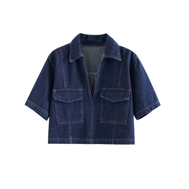 Close-up of short-sleeve denim top with deep V-neckline, collar, and large front pockets – part of the Soho Denim Set