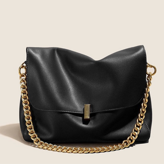Black genuine leather shoulder bag ÉLAN with bold gold chain – elegant, structured design for modern women, handcrafted 2025 edition.