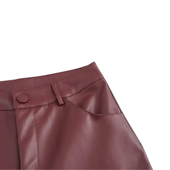 Elegant burgundy faux leather pants, ideal for fashion-forward women seeking comfort and style.