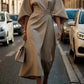 Elegant flared sleeve chiffon dress for spring events in Parisian style.