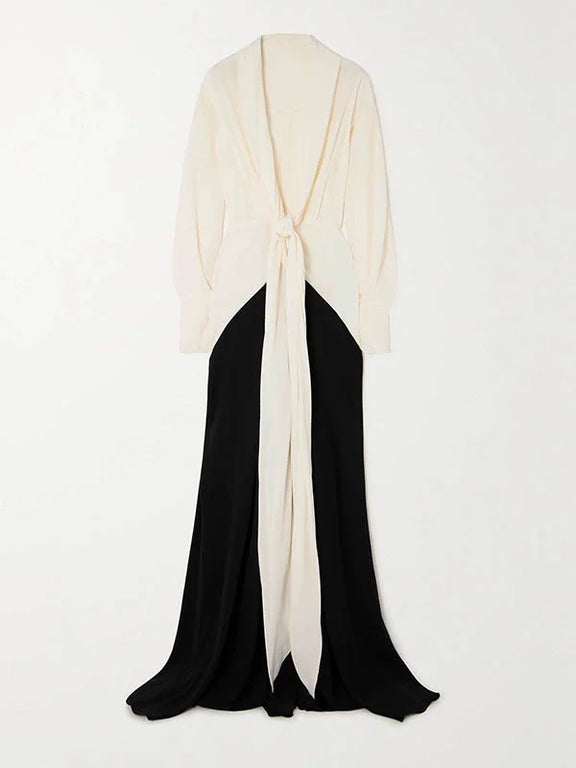 Long black and cream evening dress with concealed zipper and elegant back drape design
