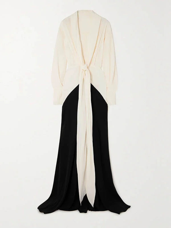 Long black and cream evening dress with concealed zipper and elegant back drape design
