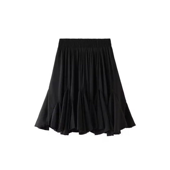 Elegant short tulle skirt with silk-like shorts, A-line fit, elastic waistband, and delicate pleats for a feminine, stylish look. Perfect for parties and special occasions