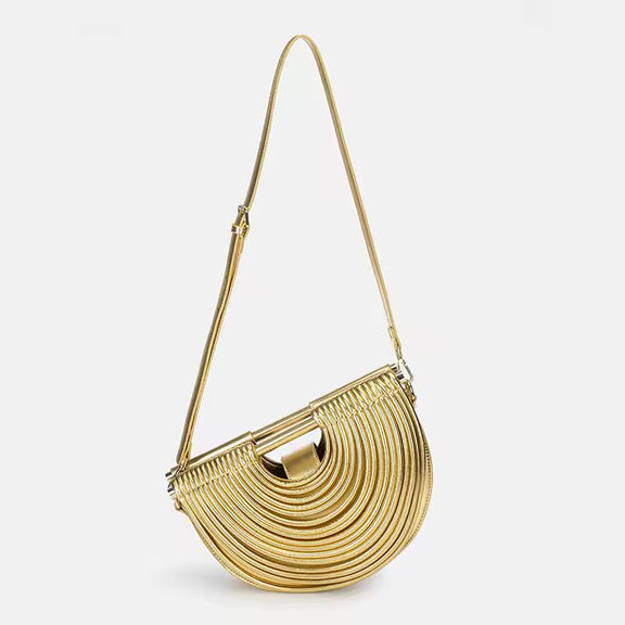 Luxury gold fan-shaped clutch bag Ventaglio d’Oro – structured metallic designer handbag with sculptural design.