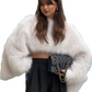 Chic women's faux fur pullover in urban style for autumn and winter, featuring long sleeves and O-neck.