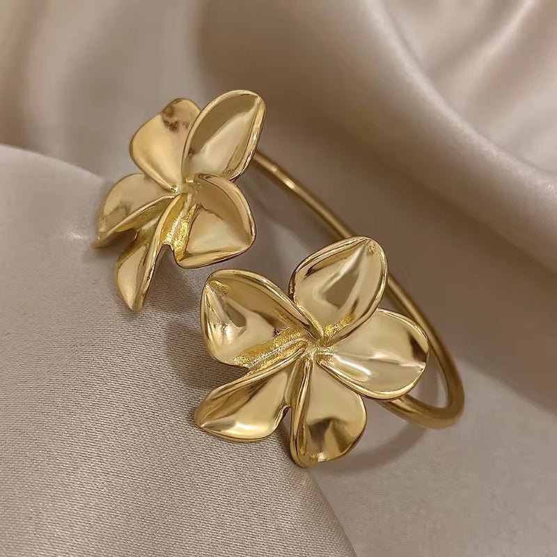 Chic gold cuff bracelet with floral design – durable travel jewelry for women by Chic and Charm
