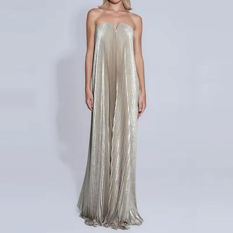 Back of strapless pleated formal dress with zip closure – metallic gold fabric, long and flattering cut.