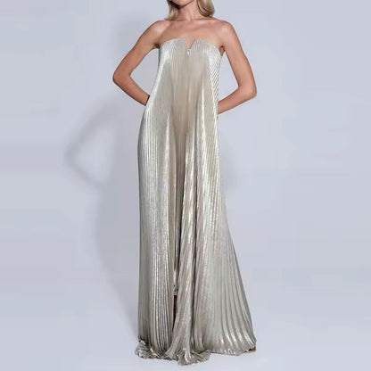 Back of strapless pleated formal dress with zip closure – metallic gold fabric, long and flattering cut.”