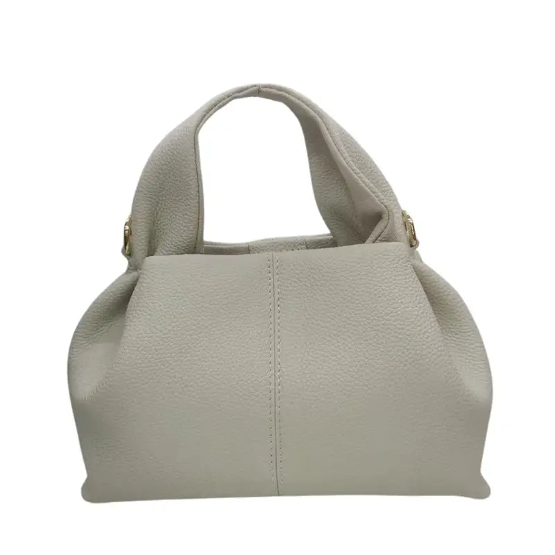 UrbanStyle handbag made from high-quality PU leather in white, grey, khaki, brown, and black. Adjustable size from 24-43 cm, perfect for modern women who appreciate a stylish, durable, and practical bag. Elegant and versatile for everyday use or special occasions.