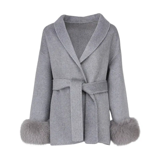 Close-up of removable fur cuffs on Guardian Shearling Jacket, showcasing elegant design and high-quality materials for fashionable outerwear.
