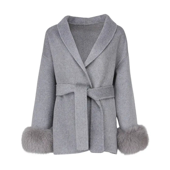 Close-up of removable fur cuffs on Guardian Shearling Jacket, showcasing elegant design and high-quality materials for fashionable outerwear.
