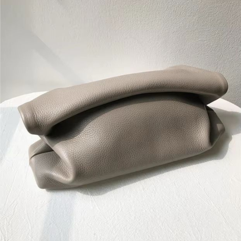 Mnimalist nude leather purse for women, lightweight and stylish with interior pocket
