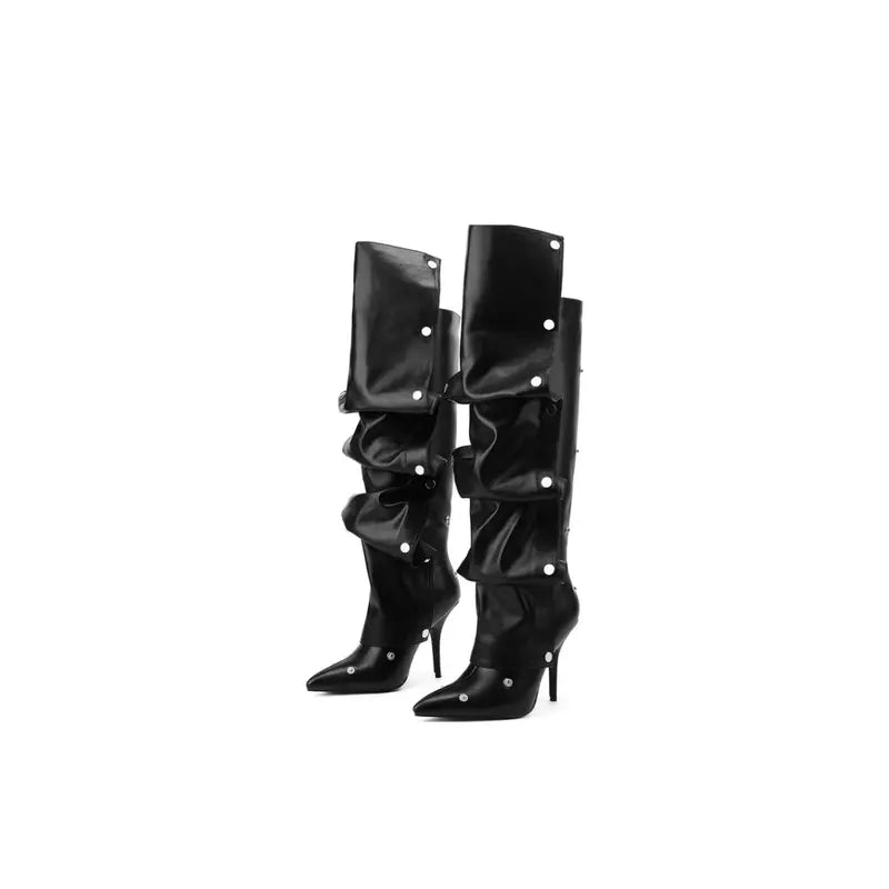 High boots with unique ruffled design in faux leather featuring silver studs for a bold fashion statement.
