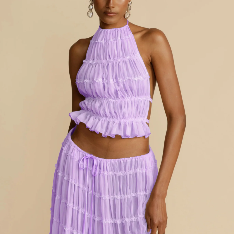 Boho-chic Ibiza dress – 2-piece summer outfit with a flowy pleated maxi skirt and backless halter top, perfect for beach vacations, weddings & festivals.