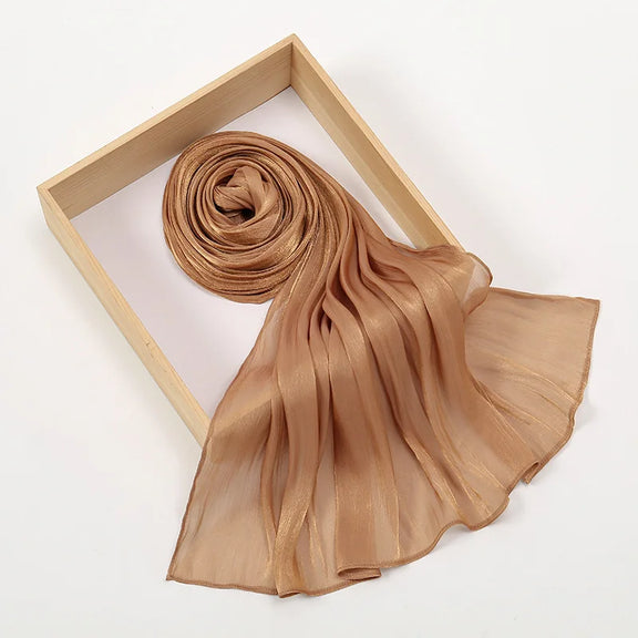 Modest fashion hijab with silky shimmer and flowy drape
