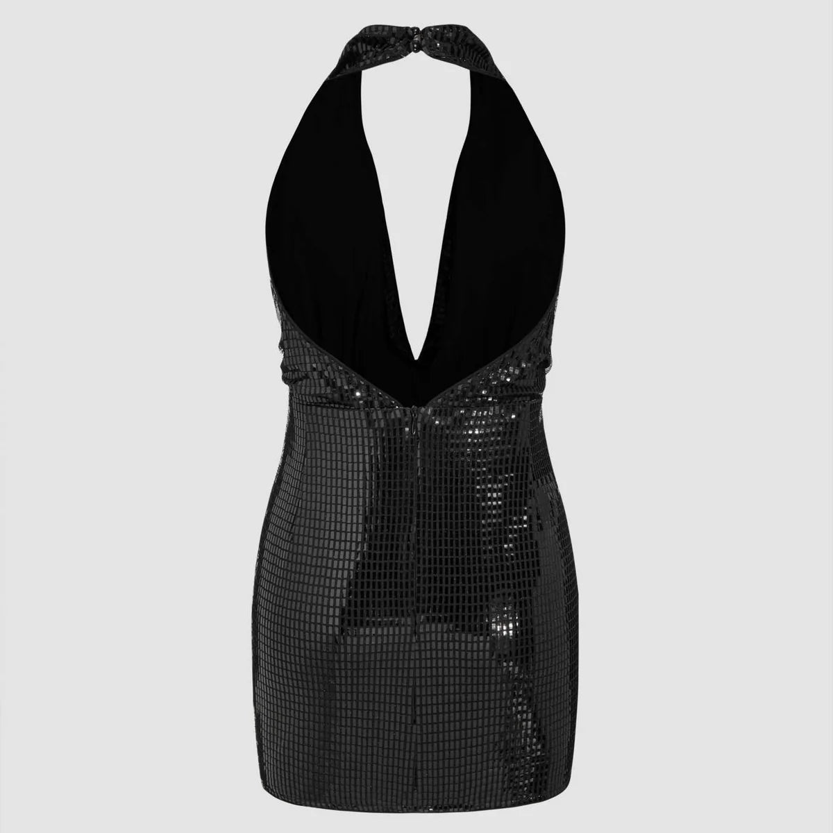 Side view of shimmering black sequin party dress with halter strap and curve-hugging silhouette – backless and bold eveningwear.
