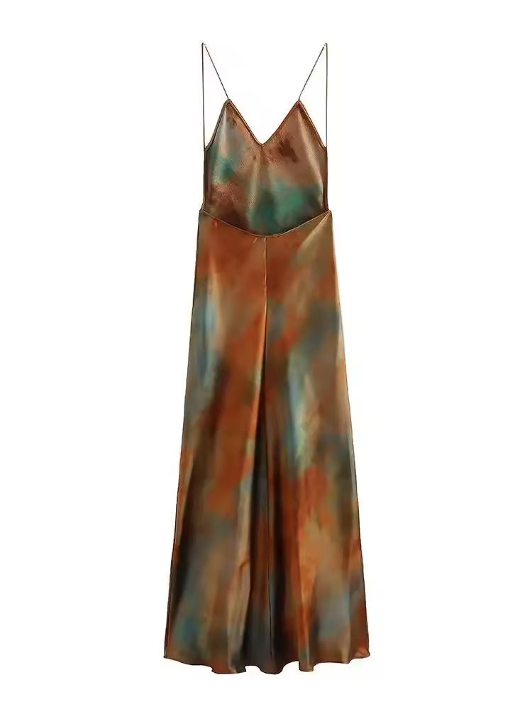 Chic boho-style vacation dress flowing in the breeze with ocean view and palm trees.
