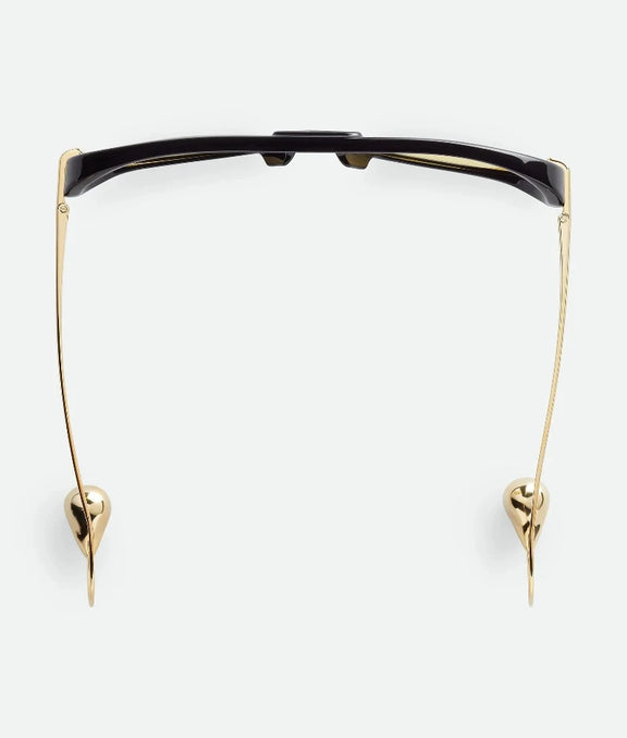 LAYAH tortoise shell sunglasses with angular frame and UV400 lenses, front view.
