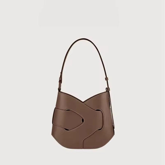 Luxury women’s leather handbag with adjustable strap – Axis crossbody bag in black and taupe