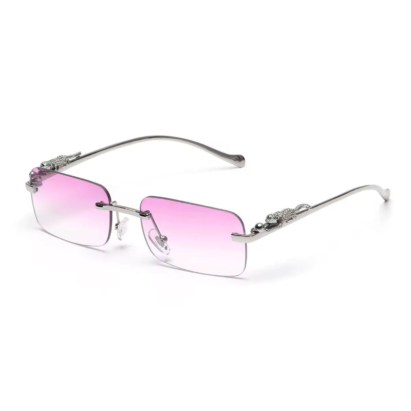 Rose gold rimless sunglasses with gradient lenses and luxury gold panther arms
