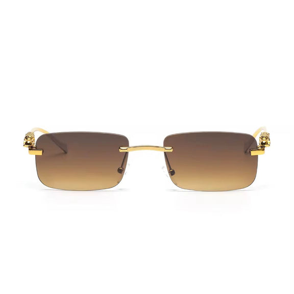 Brown UV400 sunglasses with rimless frame and golden big cat design on the temples
