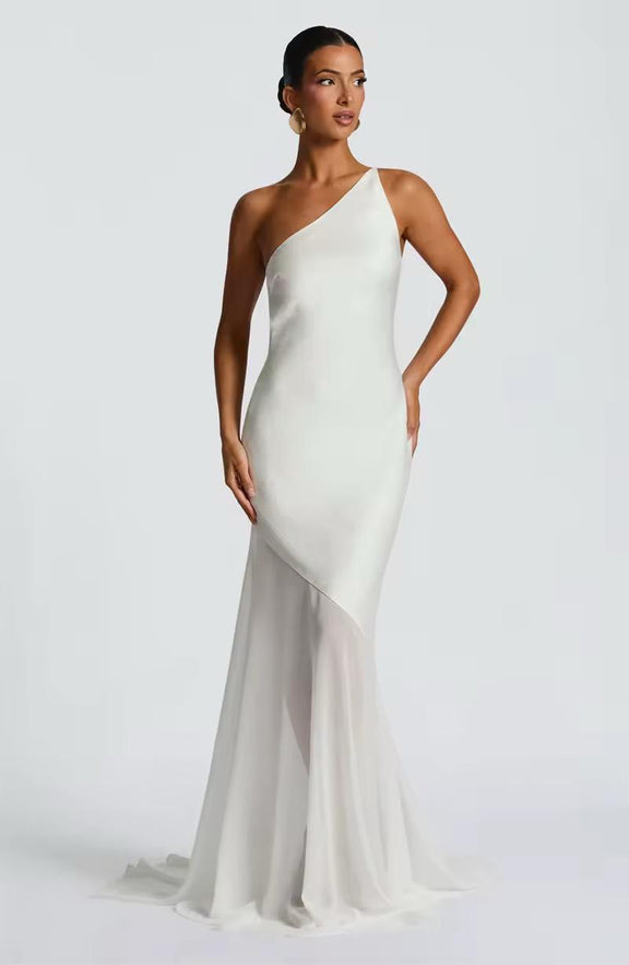 Elegant ivory white formal gown with asymmetrical neckline and body-hugging silhouette for events
