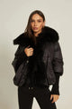High-quality fabric and label details of Maison de Fox down jacket – premium white duck down filling and real fox fur.
