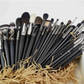 Makeup brush with an elegant design featuring a wooden handle and high-quality hairs for perfect makeup applications. Ideal for blusher, concealer, and eyeshadow.