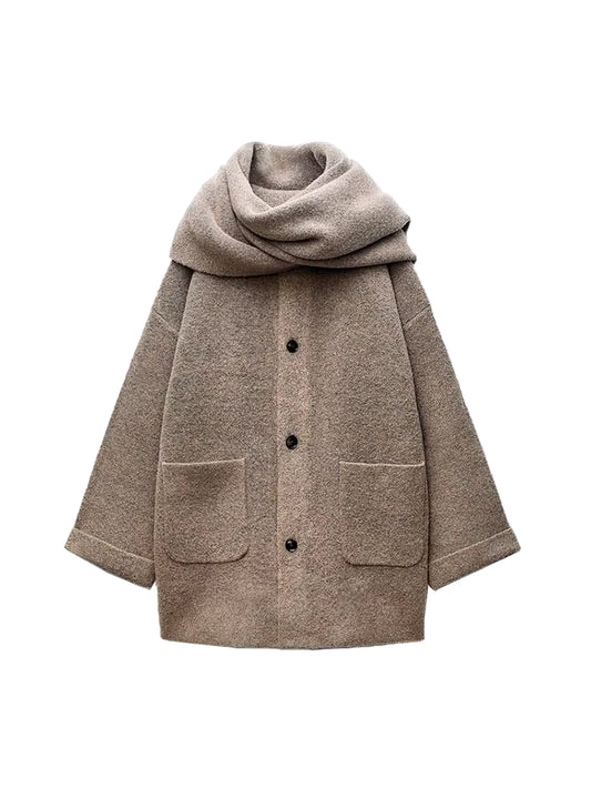 Elegant beige wool blend coat with attached scarf, single-breasted design and oversized silhouette for fall winter 2025.