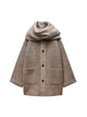 Elegant beige wool blend coat with attached scarf, single-breasted design and oversized silhouette for fall winter 2025.