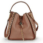 Chic crossbody bag for women featuring genuine leather and edgy studs. Must Valentino Style 