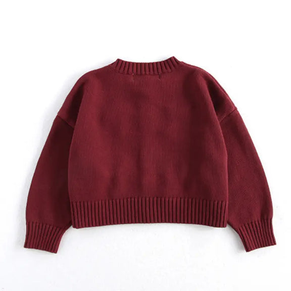 Stylish maroon cotton cardigan for girls, featuring O-neck, long sleeves, ribbed cuffs, and brown buttons. Perfect for fall and winter, available for girls aged 1-6 years in sizes 80-130 cm. Comfortable and fashionable kids’ clothing for cold weather.