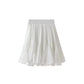 Elegant short tulle skirt with silk-like shorts, A-line fit, elastic waistband, and delicate pleats for a feminine, stylish look. Perfect for parties and special occasions