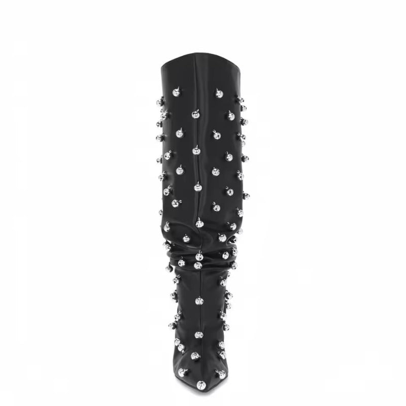 Black knee-high PU leather stiletto boots with metal spike studs, pointed toe and slouch wide shaft.