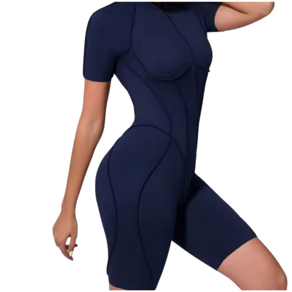 NIKI POWERFORM navy blue one-piece workout jumpsuit – shaping fit with zip front and elegant backless design