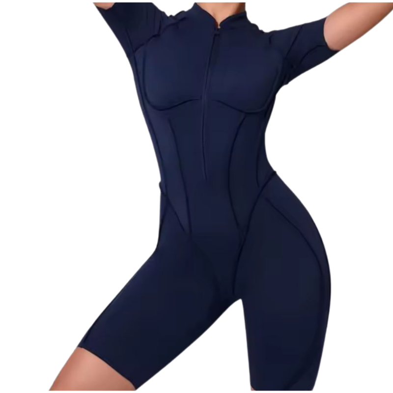 NIKI POWERFORM navy blue one-piece workout jumpsuit – shaping fit with zip front and elegant backless design