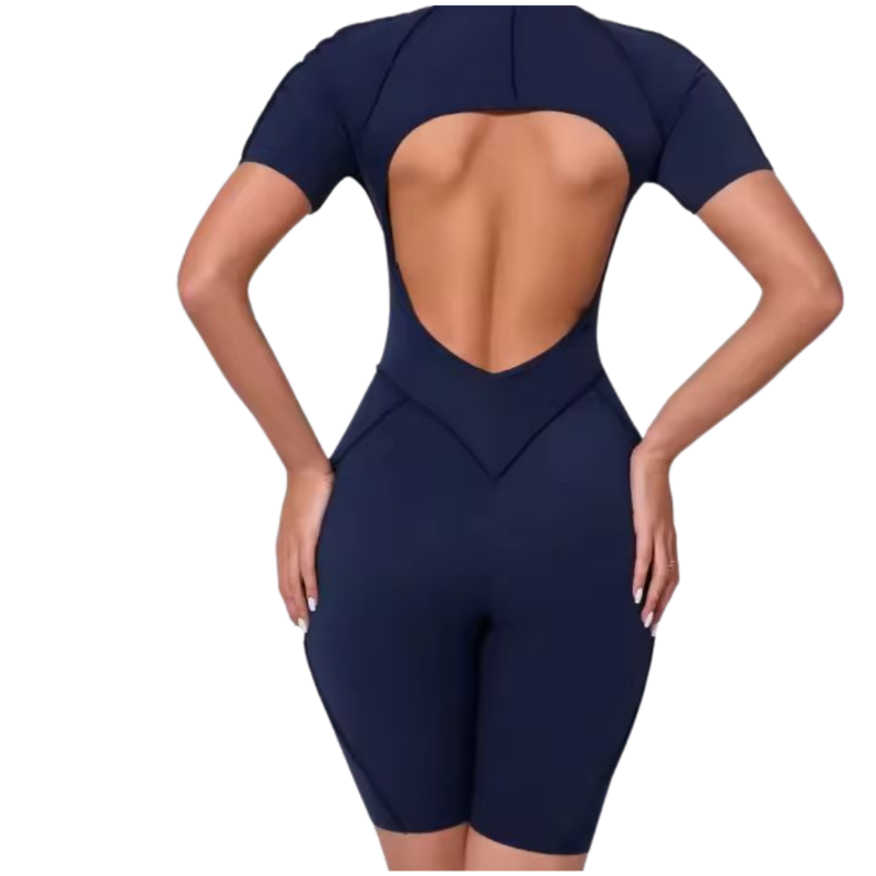 NIKI POWERFORM navy blue one-piece workout jumpsuit – shaping fit with zip front and elegant backless design
