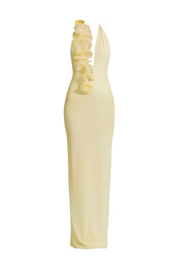 Noa yellow halter dress 2025 – floor-length backless gown with ruffle neckline, A-line silhouette, soft stretch polyester-spandex fabric. Elegant summer outfit for beach weddings, club nights, luxury vacations & golden hour events.