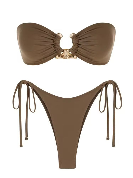 Elegant mocha brown bandeau bikini with gold hardware ring and adjustable low-rise bottoms – minimalist beachwear for summer 2025.
