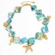 Boho ocean charm necklace with starfish, turtle, shell, and seahorse pendants – Mira del Mar summer jewelry for women
